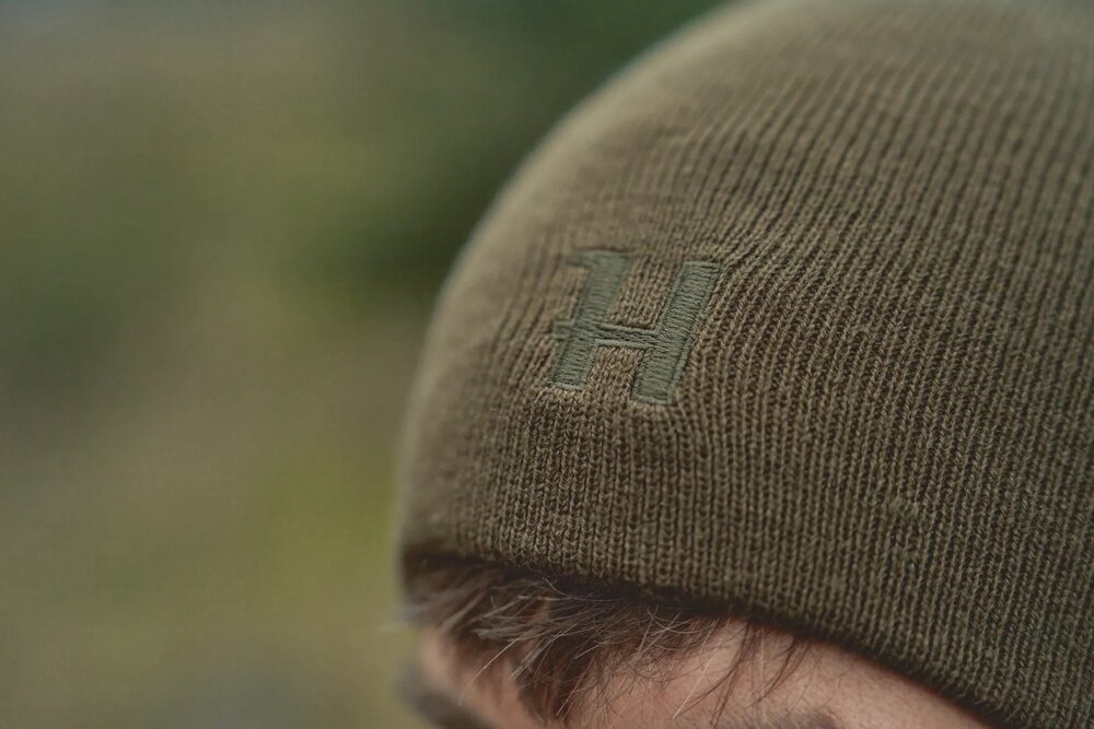 Harkila reversible beanie Willow green/orange