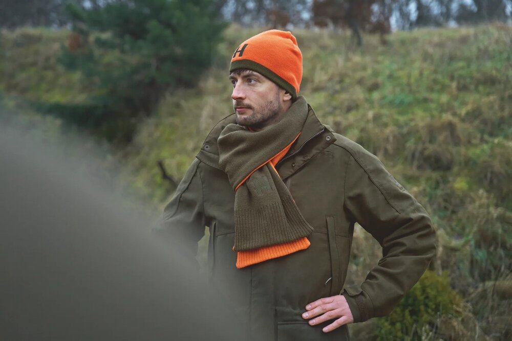 Harkila reversible beanie Willow green/orange